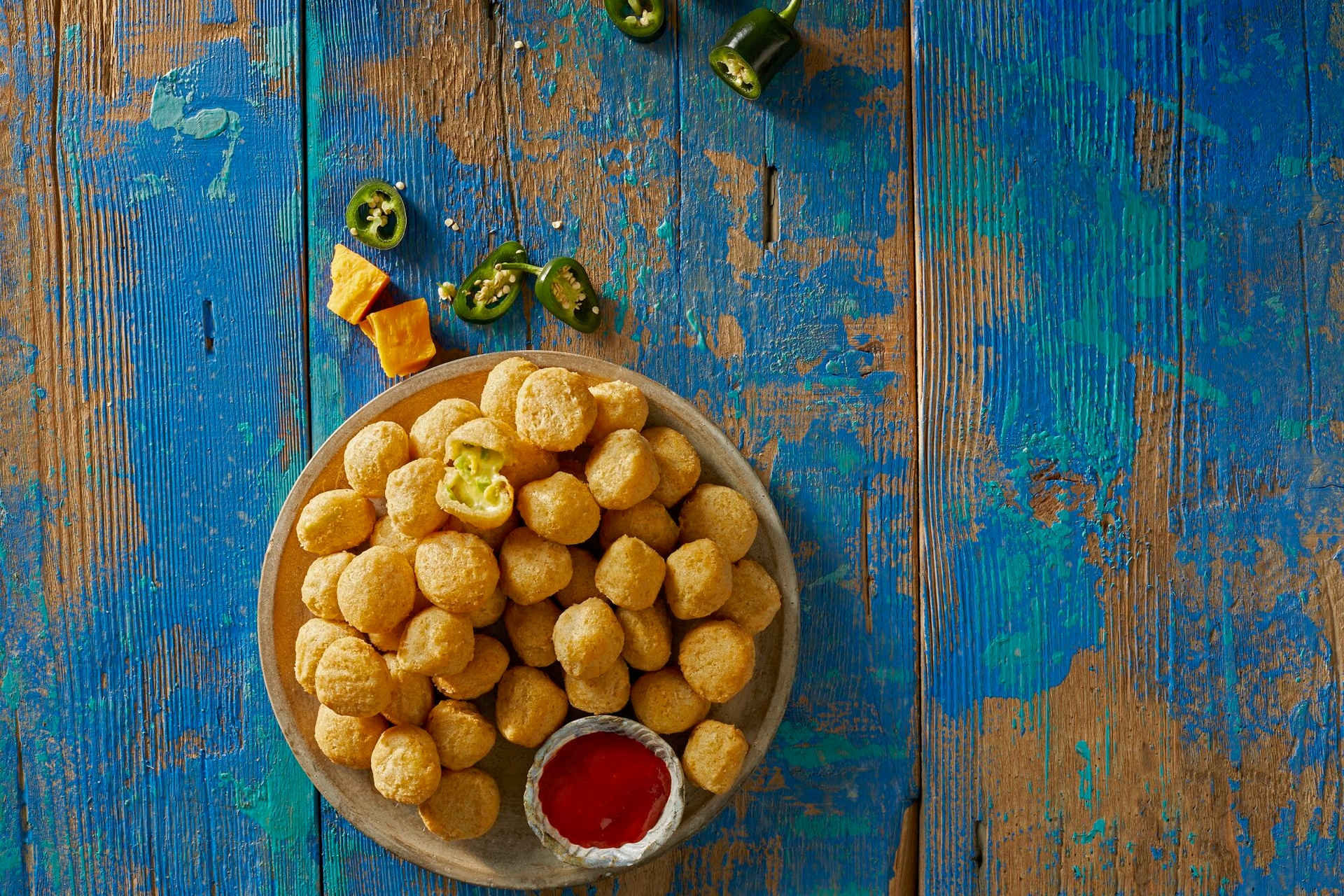 809119_aviko_obalovane_syrove_nugety_z_cedaru_s_chilli_paprickami_1000_g_pokrm